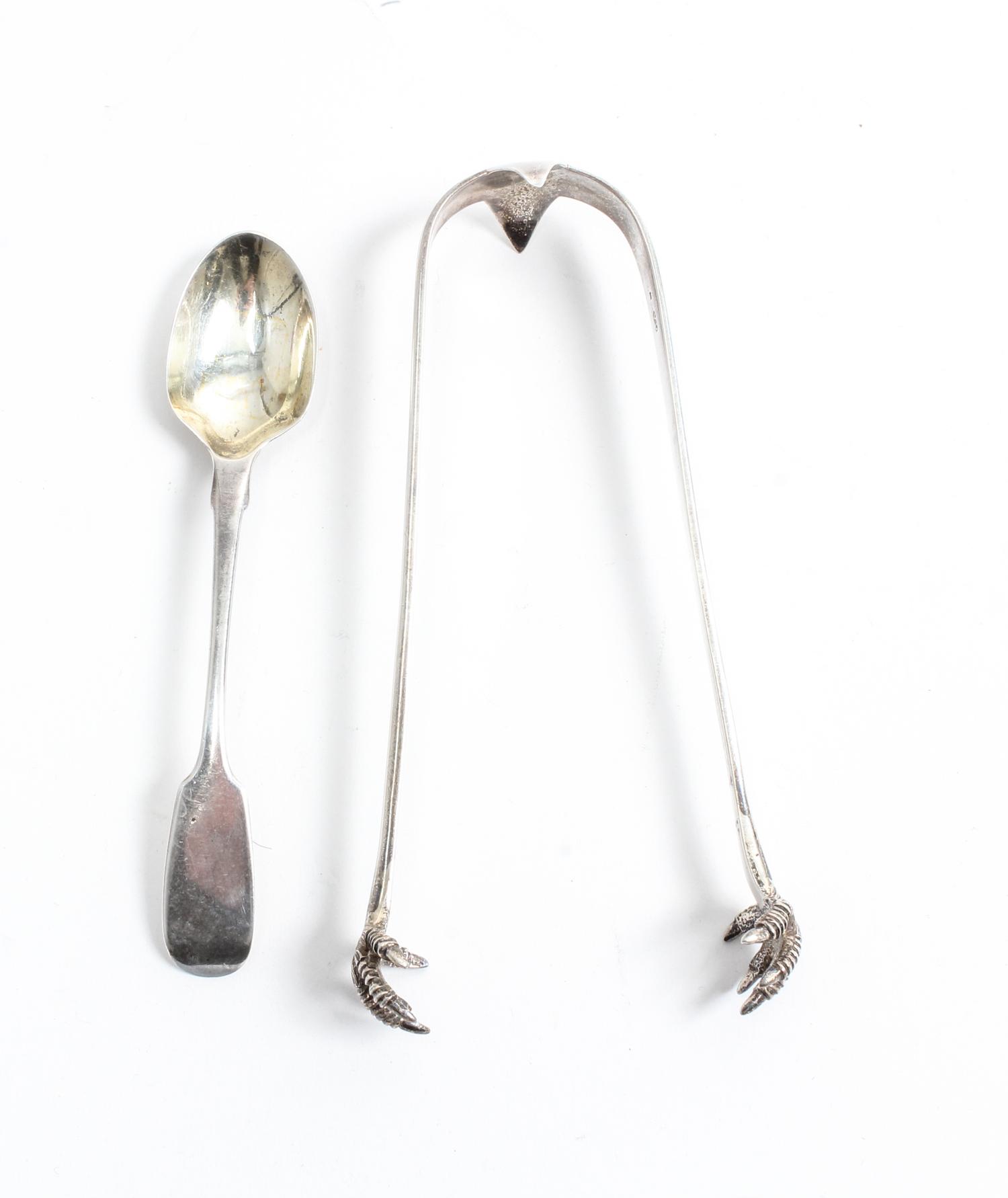 Two Victorian Silver Flatware Articles, , comprising sugar tongs with claw grips marked George William Adams, London, 1866, and a silve