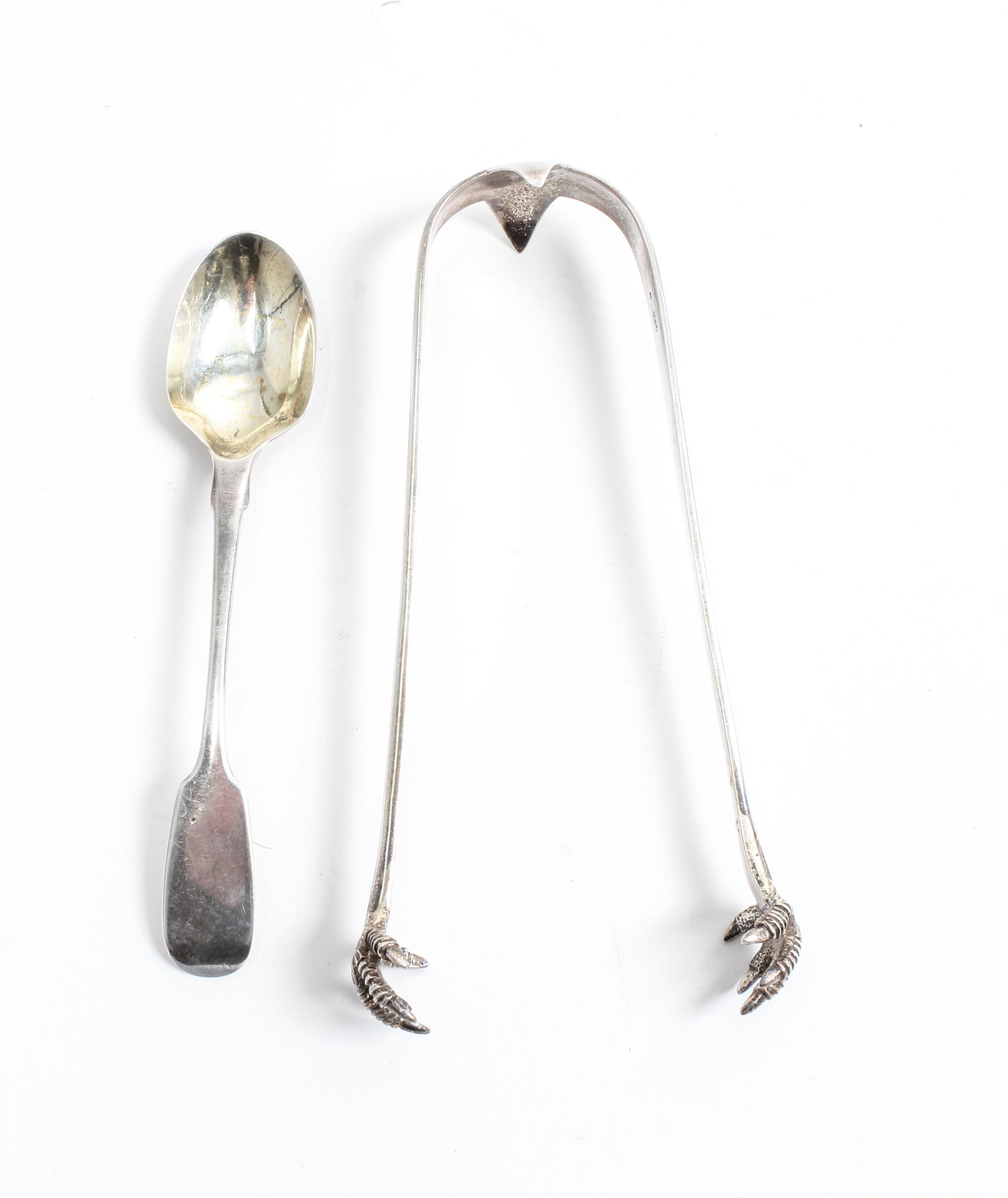 Two Victorian Silver Flatware Articles, , comprising sugar tongs with claw grips marked George William Adams, London, 1866, and a silve
