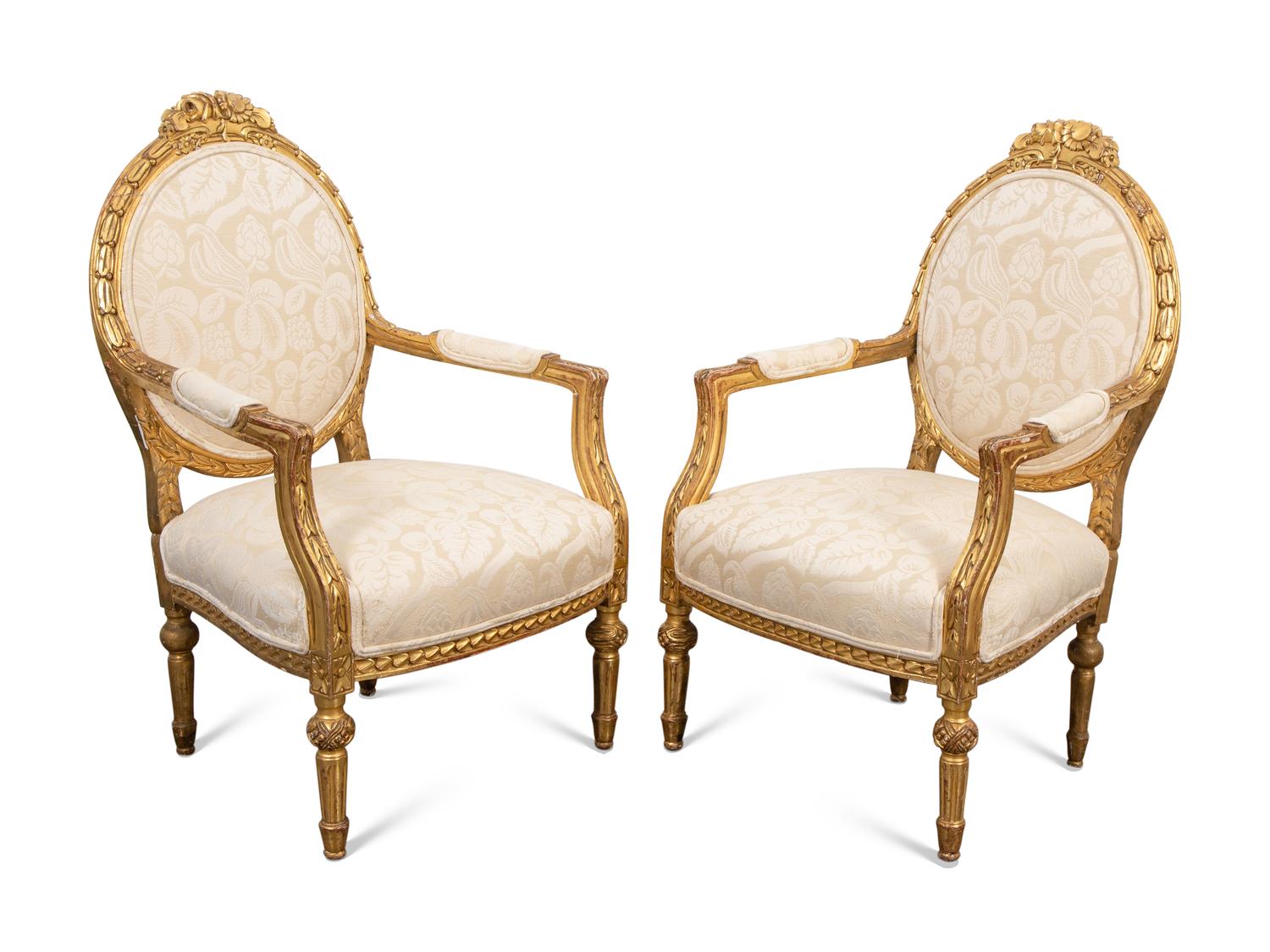 A Pair of Louis XVI Style Giltwood Fauteuils