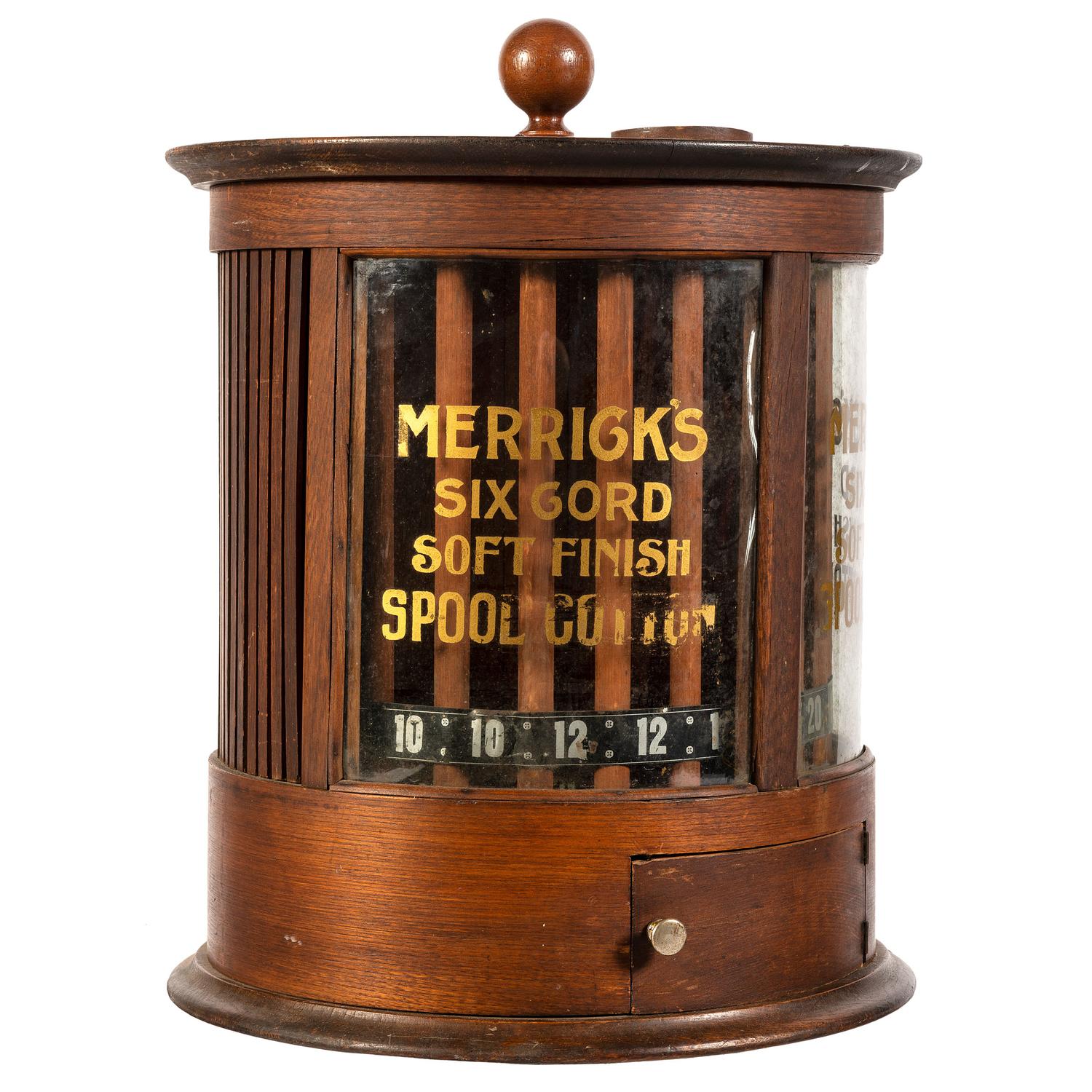 A Merrick's Six Cord Cylindrical Spool Cabinet