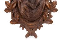 A Black Forest Carved Stag Head