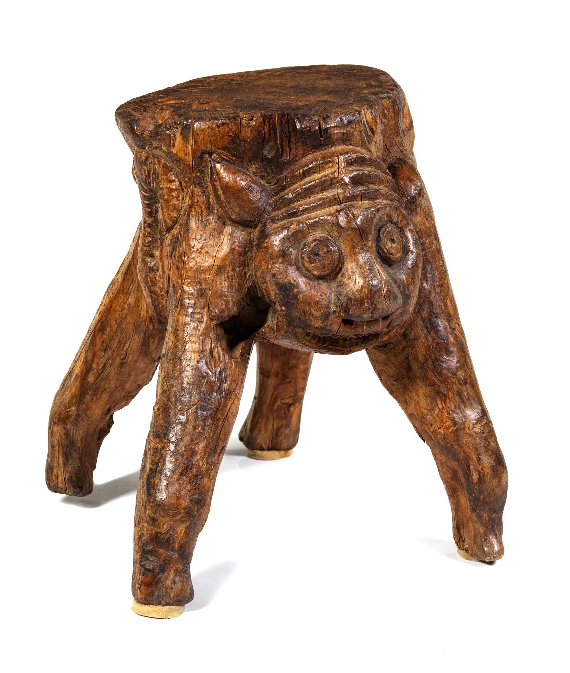 A Carved Foot Stool Height 14 1/4 inches.