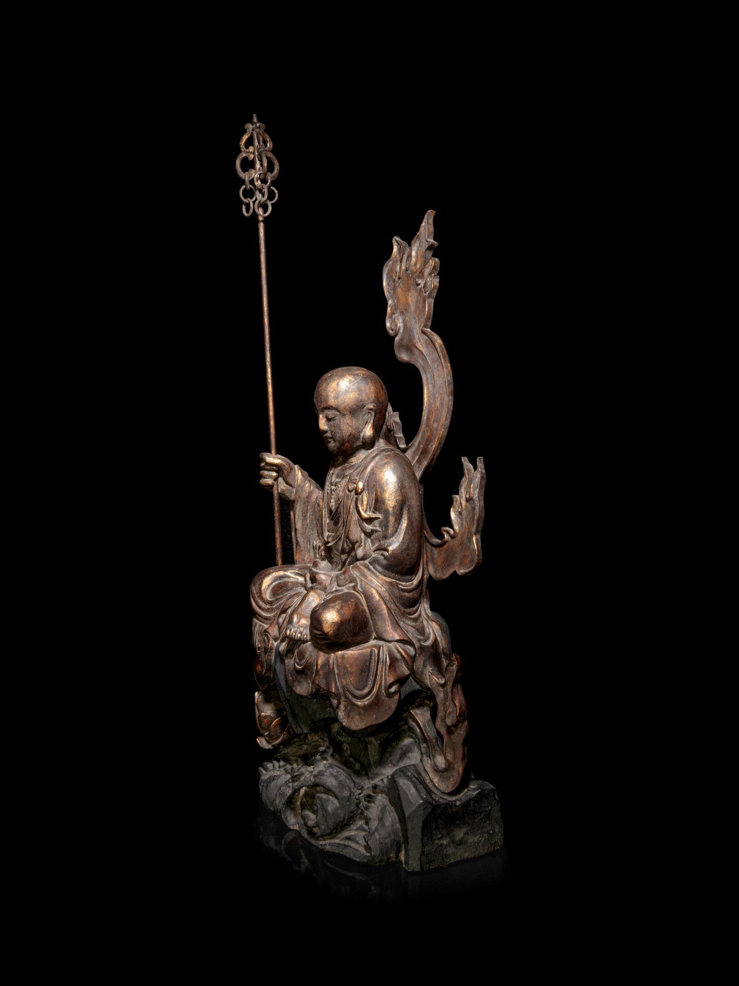 A Large Gilt Decorated Wood Figure of a Seated Monk