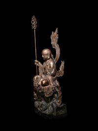 A Large Gilt Decorated Wood Figure of a Seated Monk