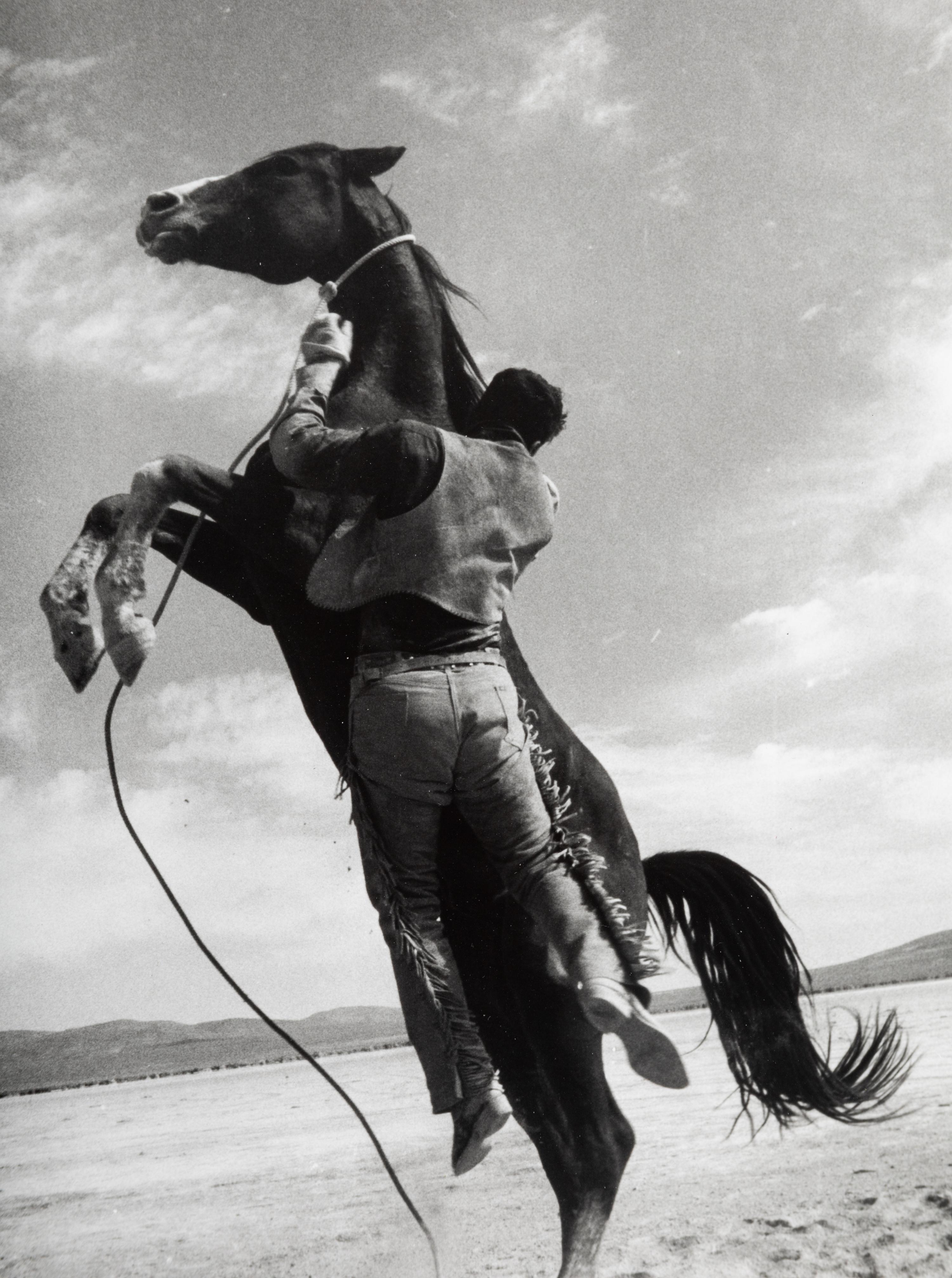 Ernst Haas (1921-1986) Leaping Horse (Clark Gable as Guy Langland doing his own stunts, on the set of "The Misfits,") Nevada, 1960