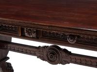 An Italian Renaissance Style Walnut Library Table
