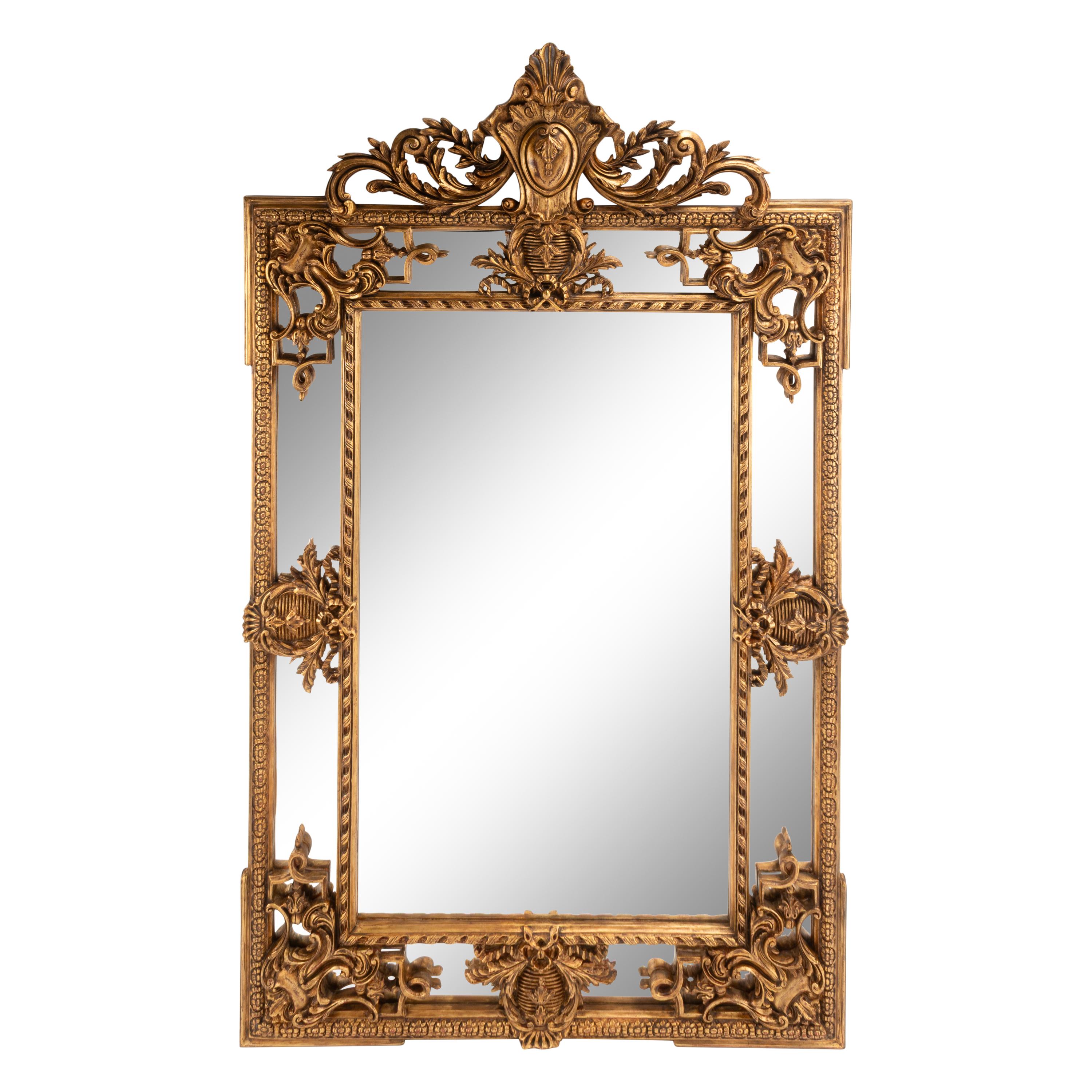 A Pair of Large Régence Style Giltwood Mirrors
