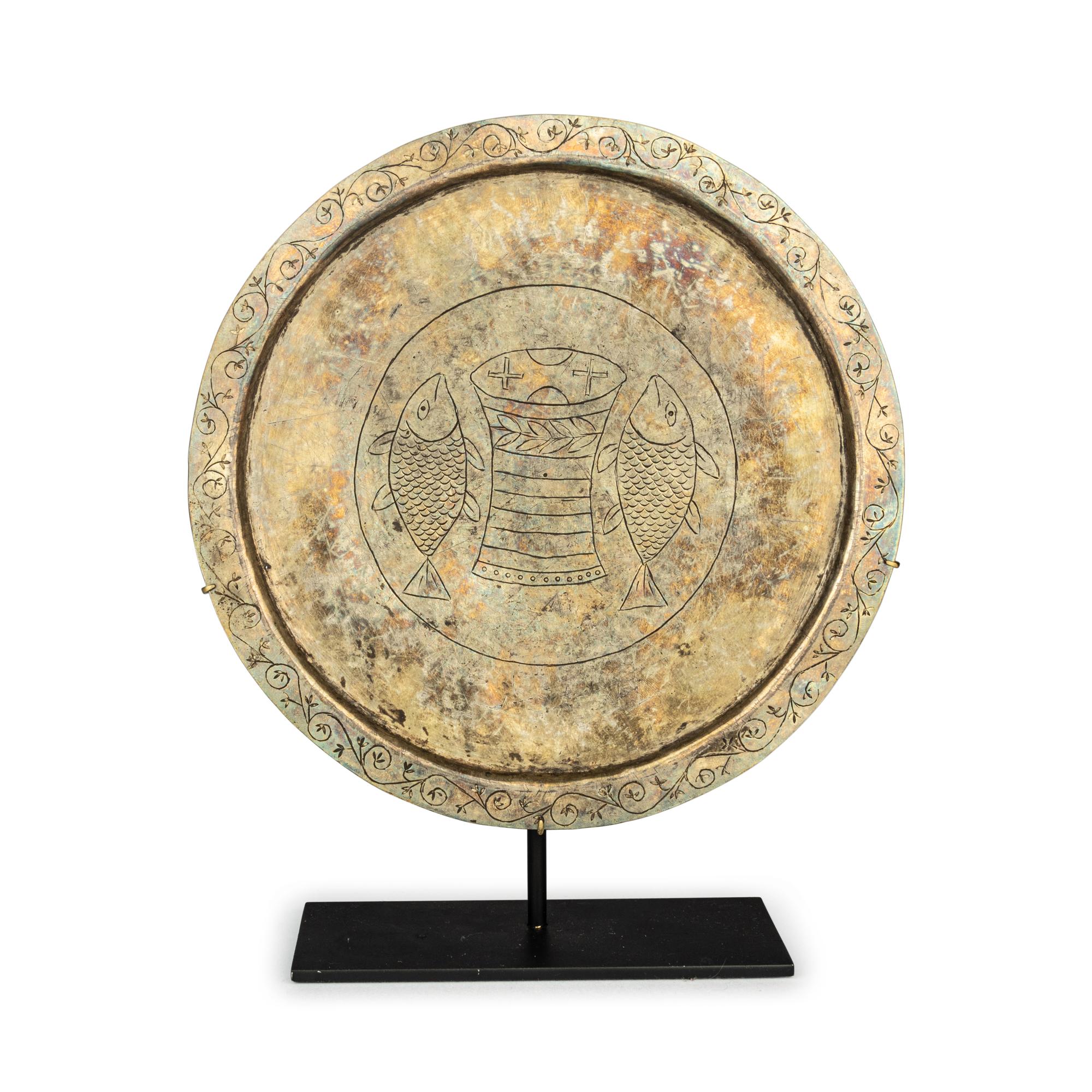 A Byzantine Gilt Silver Paten with Fish and Breadbasket