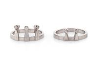 SWEDISH, MODERNIST, WHITE GOLD AND DIAMOND CROWN INTERLOCKING RING SET