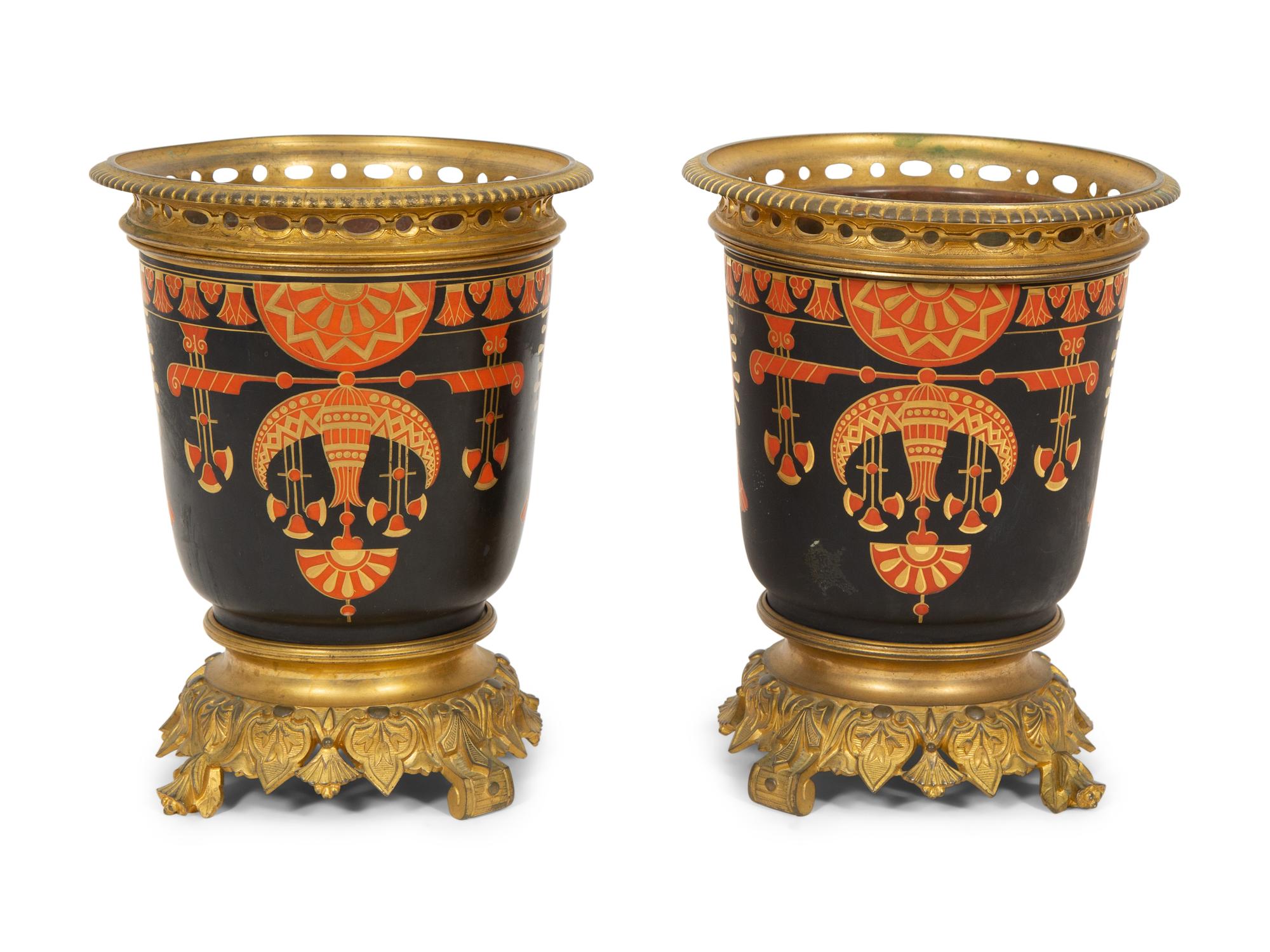 A Pair of French Egyptian Rivival Gilt Bronze Mounted Porcelain Cache Pots