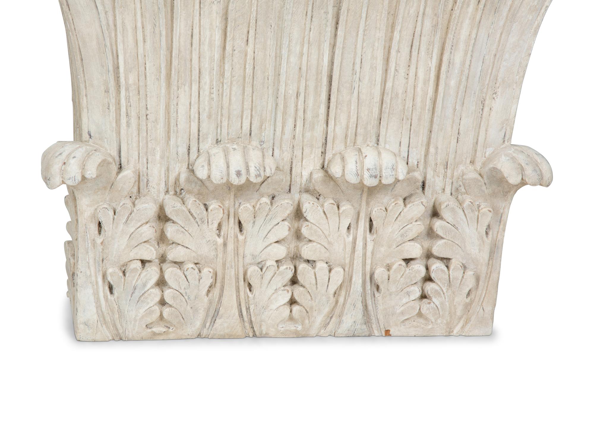 An Assembled Pair of Carved Wood Corinthian Column Capitals — CIRCA 1930