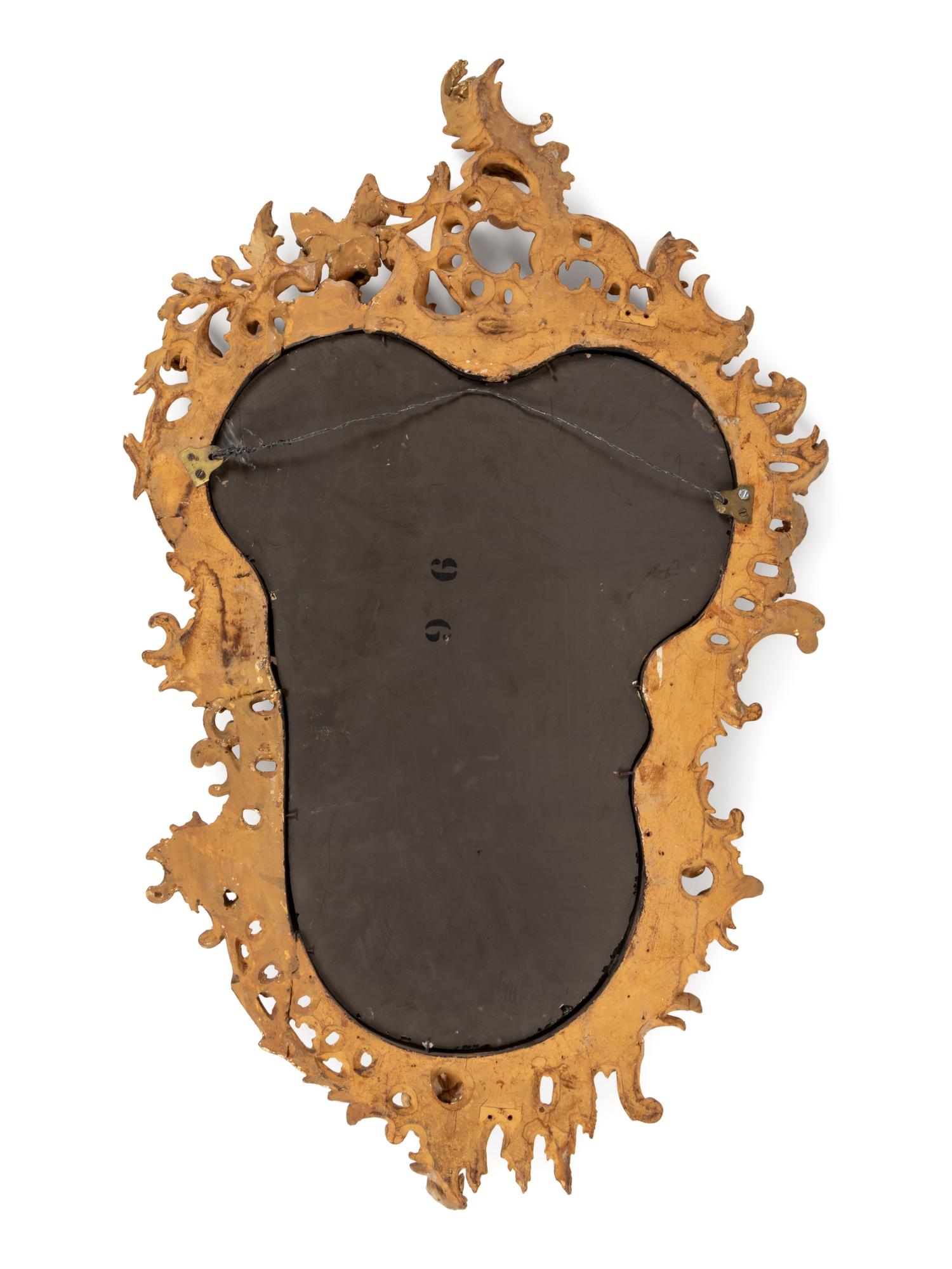 A Pair of Louis XV Giltwood Mirrors