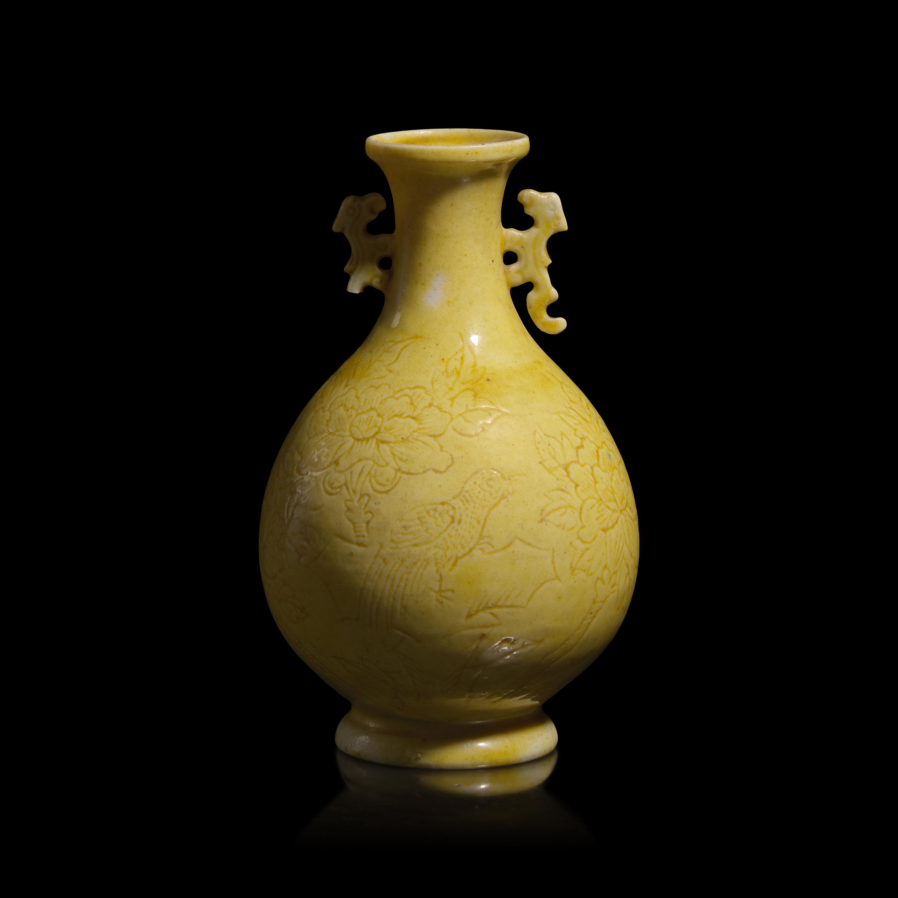 A Chinese Incised Yellow Glazed Small Vase, Qing Dynasty — 清 黃釉暗刻花鳥紋雙耳瓶