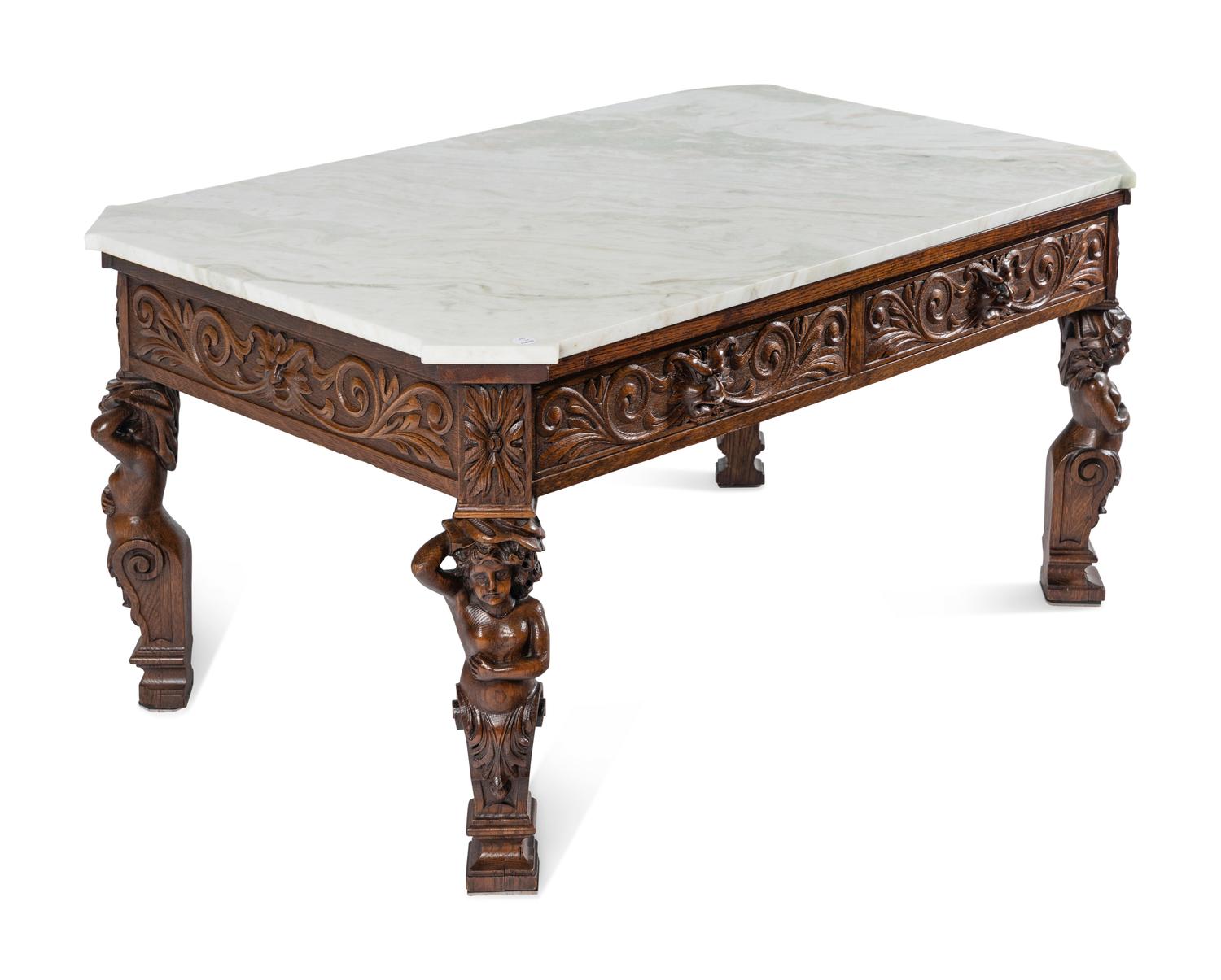 A Renaissance Style Carved Oak Marble-Top Low Table