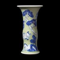A Chinese Celadon Ground Copper Red, Blue and White 'Horses' Gu Vase, Kangxi Period 清康熙 豆青地青花釉裏紅八駿圖觚