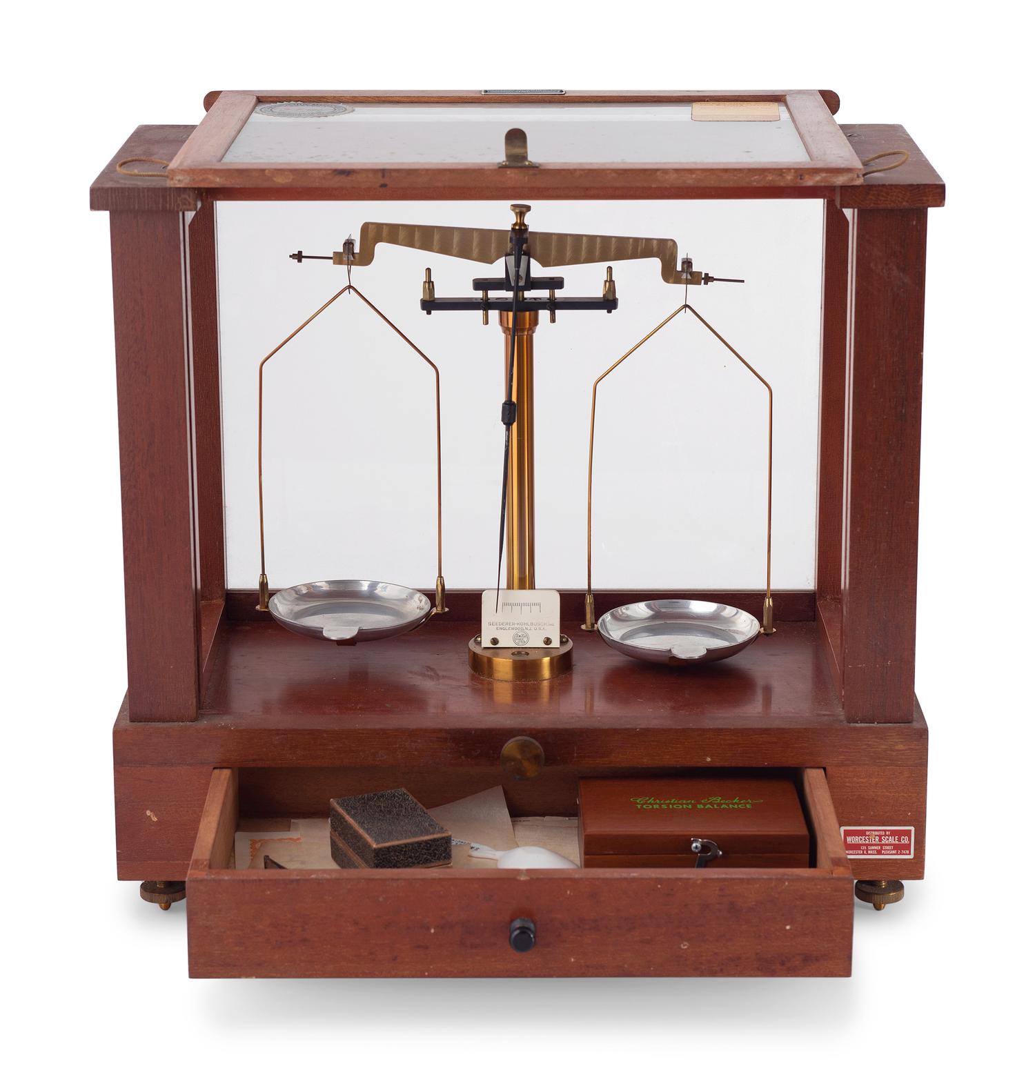A Central Scientific Co. Scale, an Ingraham Eight-Day Movement Mantle Clock and Framed Salesmen Samples of Blue Grass Axes