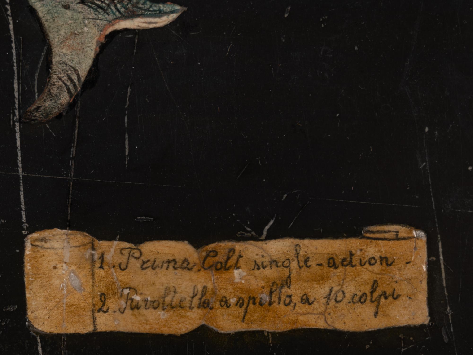 A Pair of Sgraffito Paintings of Pistols