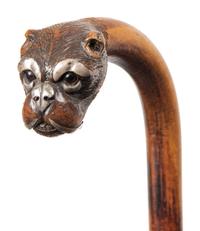 Two English Glass-Inset Carved Wood Dog's Head Canes