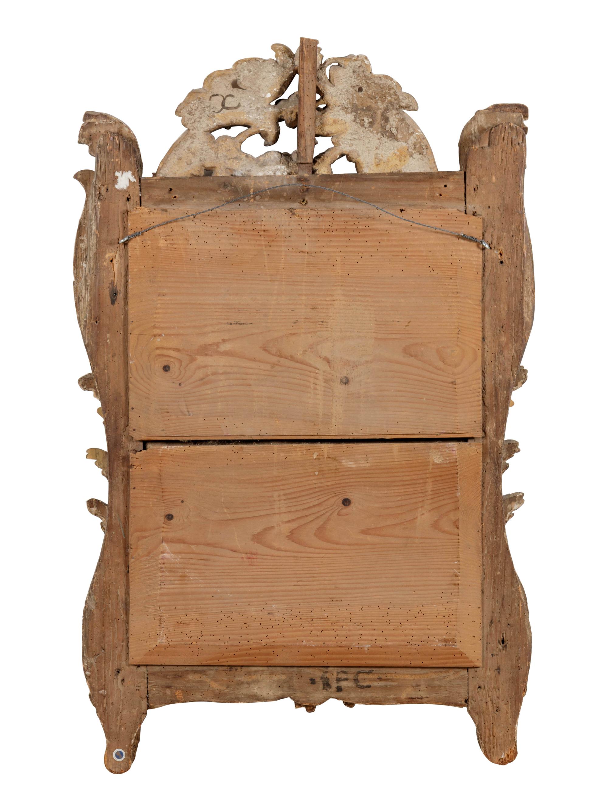A Régence Carved Giltwood Mirror
