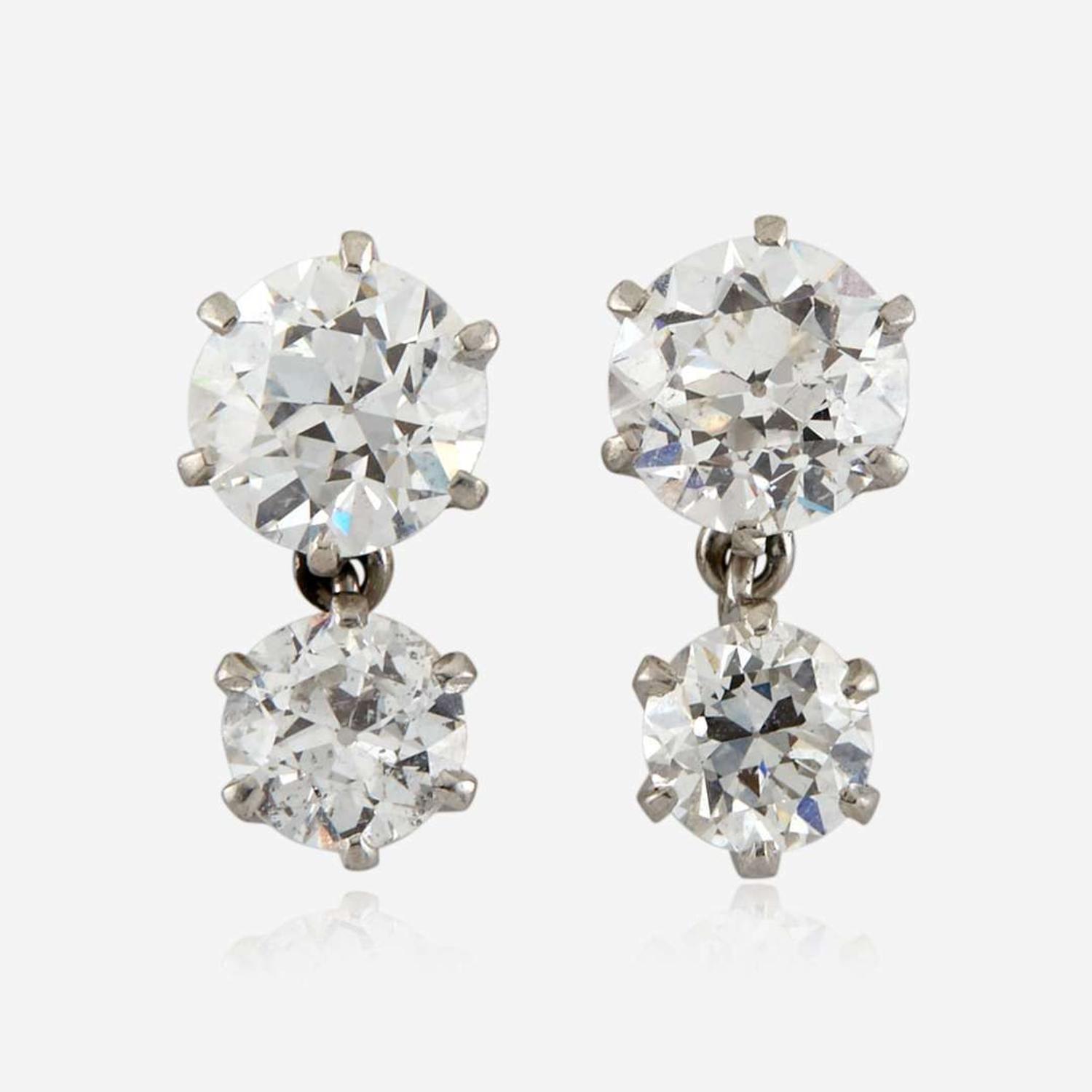 A pair of diamond and platinum earrings