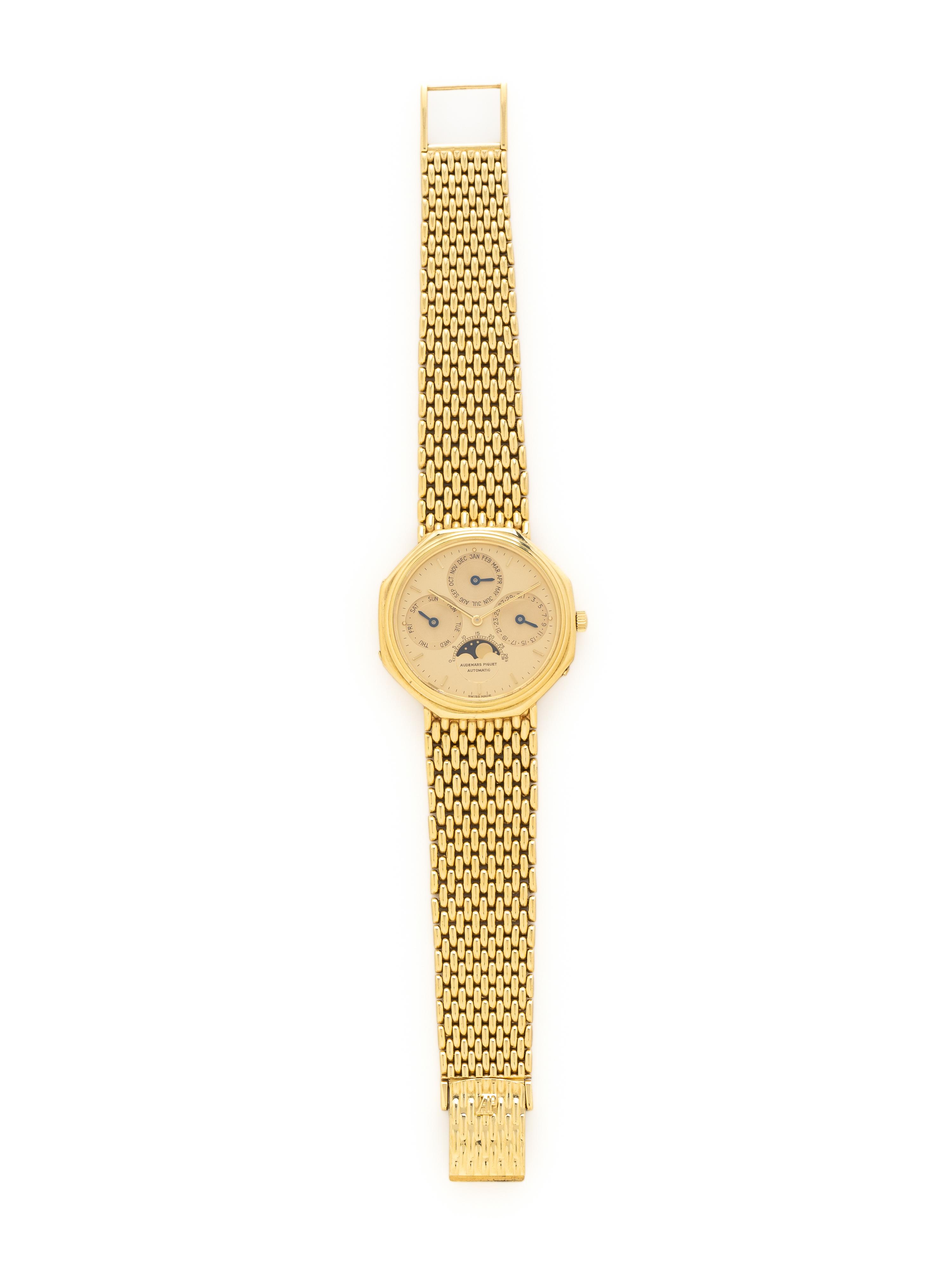 AUDEMARS PIGUET, 18K YELLOW GOLD 'QUANTIEME' 'OCTOGONE' PERPETUAL CALENDAR MOON PHASE WATCH, WITH 18K YELLOW GOLD INTEGRATED BRACELET