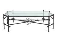 A Contemporary Bronze and Glass Cocktail Table — IN THE MANNER OF GIACOMETTI