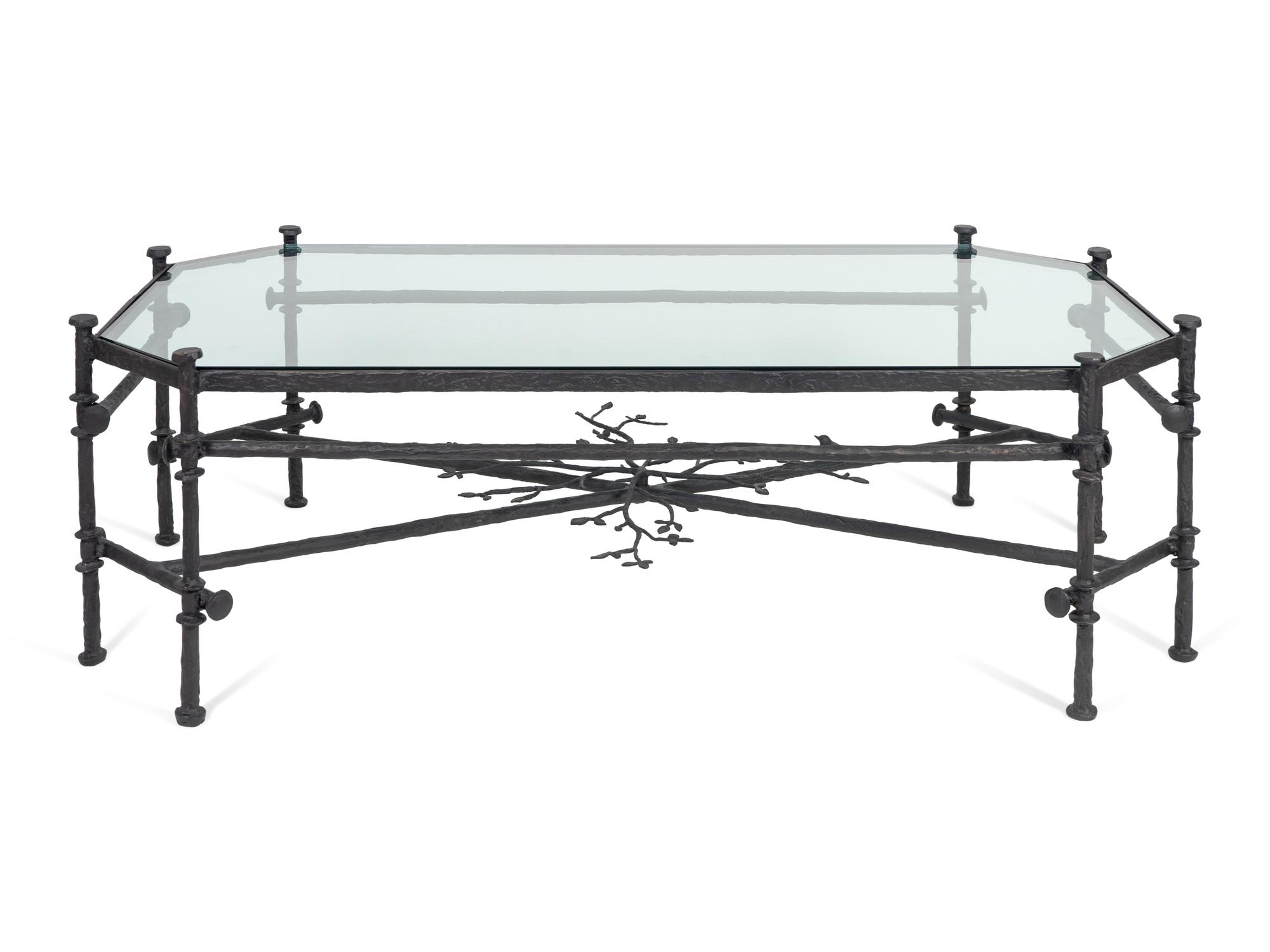 A Contemporary Bronze and Glass Cocktail Table — IN THE MANNER OF GIACOMETTI