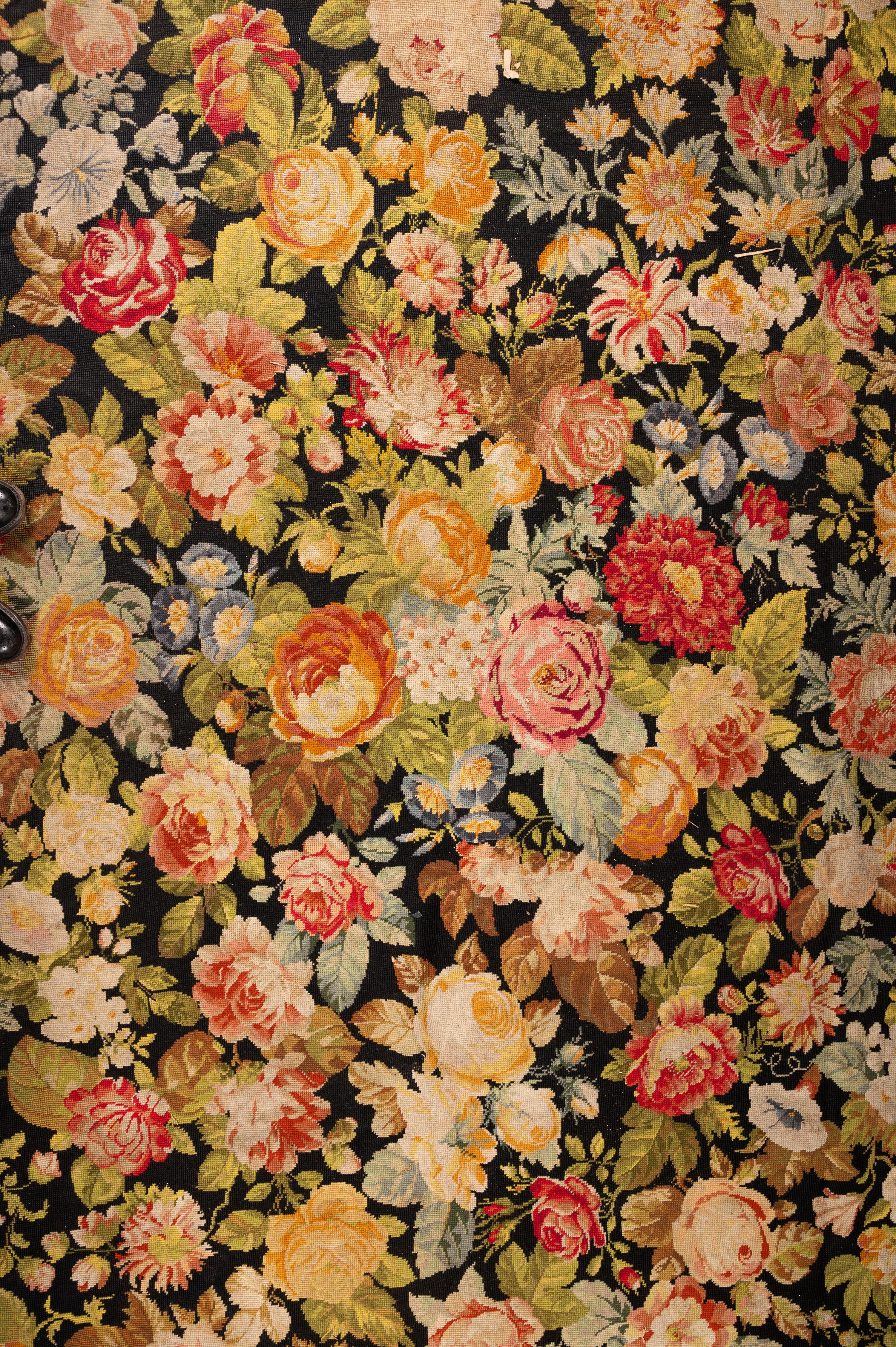 A Floral Needlepoint Rug