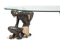 A Figural Moor Style Polychromed and Glass Top Table — 20TH CENTURY