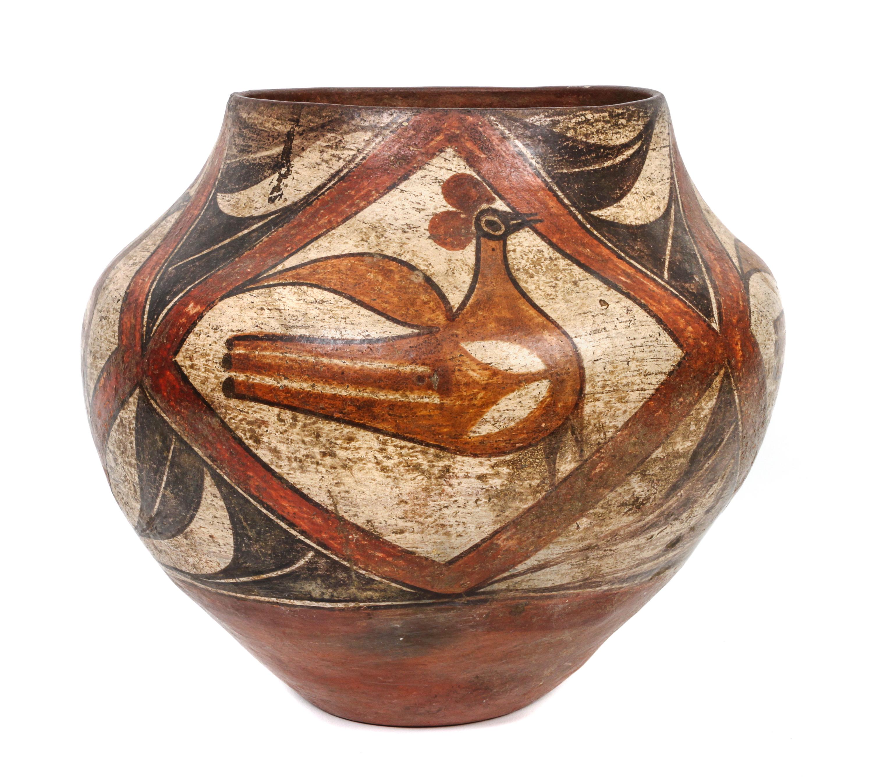 A Zia Polychrome Olla Height 9 1/2 x 10 1/2 inches.