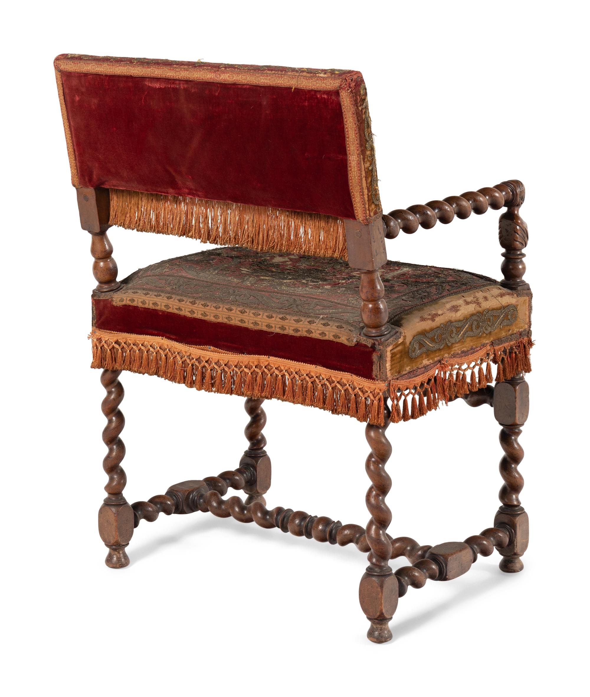 A Set of Four Baroque Revival Walnut Armchairs