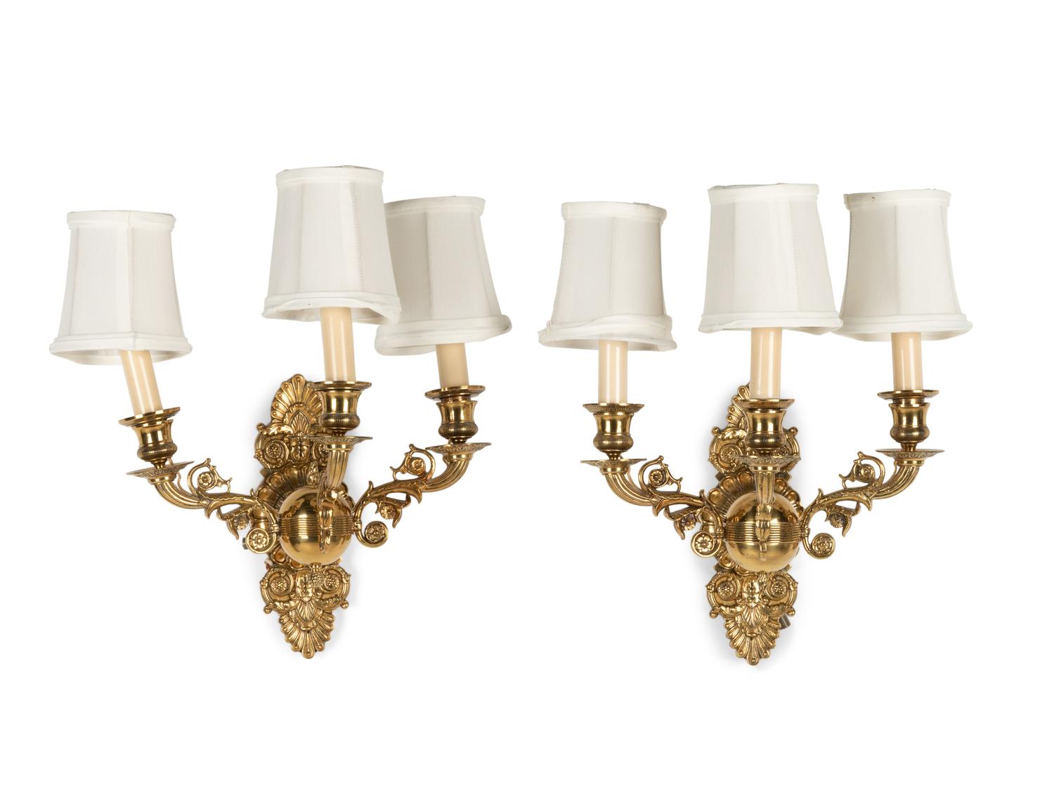 A Pair of Empire Style Brass Three-Light Sconces