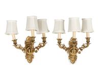 A Pair of Empire Style Brass Three-Light Sconces