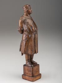 A German Carved Wood Figure of a Duck Hunter