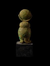 An Egyptian Bronze Baboon with a Sun Disc