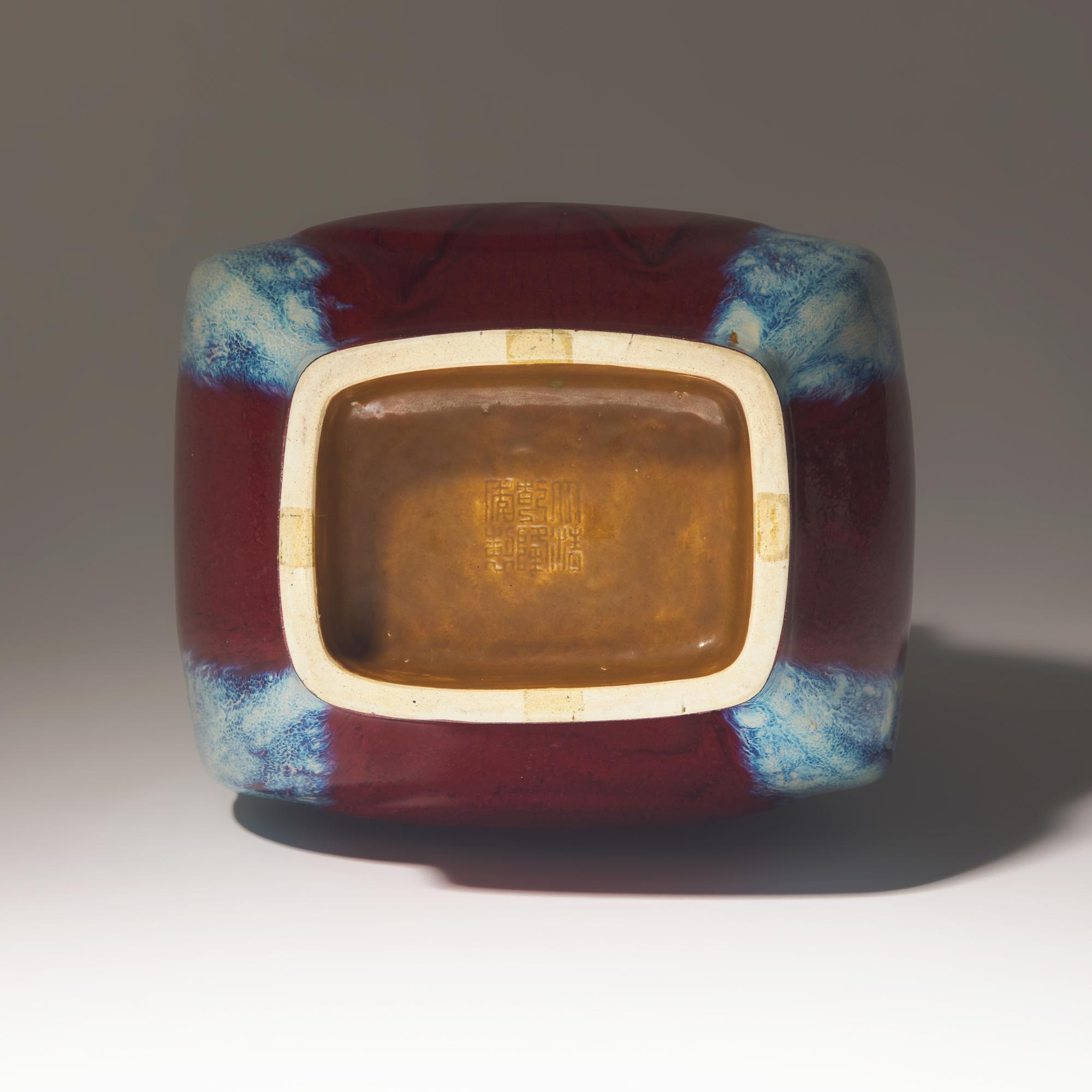 A Chinese Flambe-Glazed Vase Fanghu, Qianlong Mark and of the Period — 清乾隆 窯變釉杏圓貫耳方瓶
