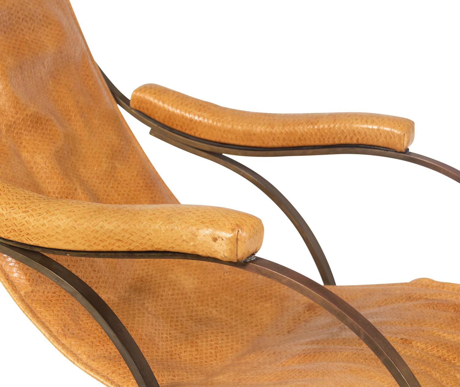 A Forged Iron and Leather Rocking Chair by R. W. Winfield and Co.