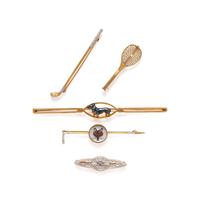 COLLECTION OF GOLD BROOCHES