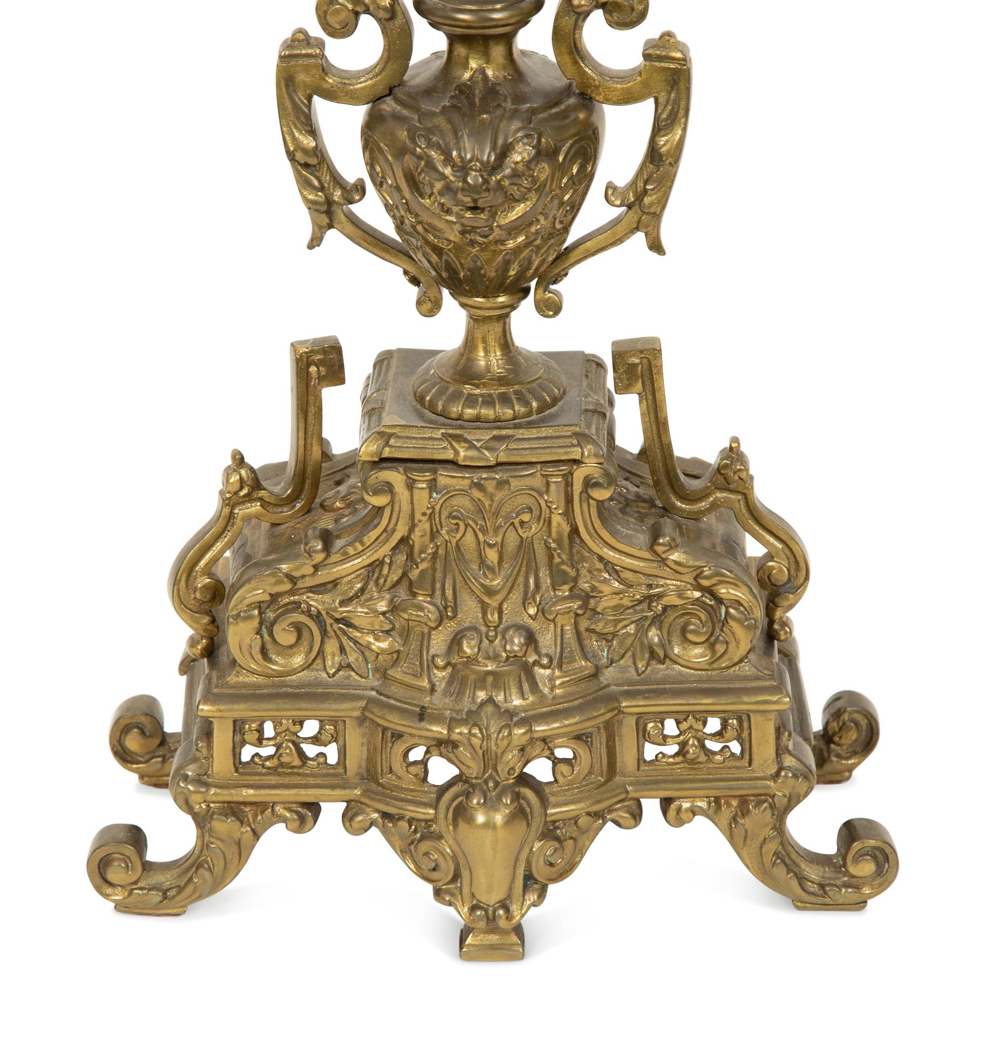 A Pair of Gilt Metal Five-Light Candelabra
