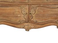 A Rococo Style Carved Bombe Side Cabinet