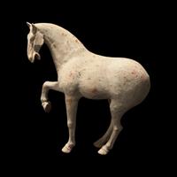 A Large Chinese Pottery Figure of a Prancing Horse, Tang Dynasty — 唐 白陶馬
