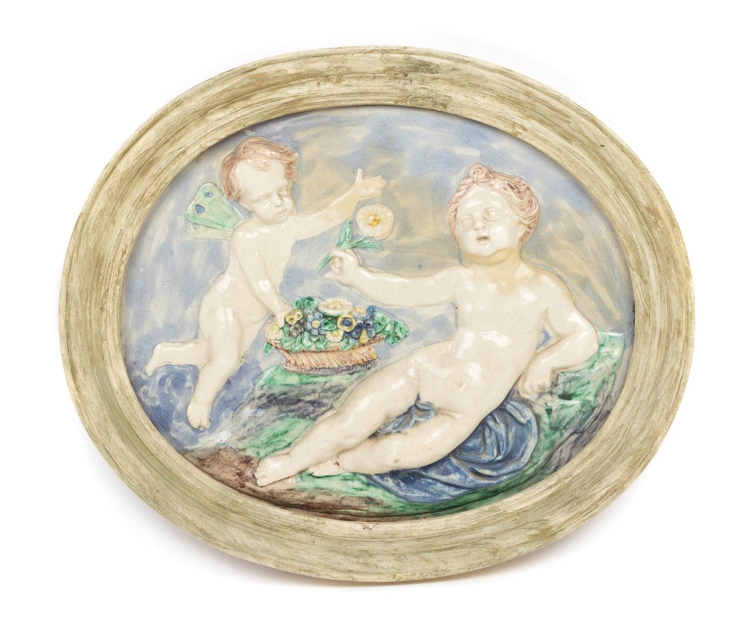 A Pair of Continental Ceramic Allegorical Plaques Width of larger 23 5/8 inches. — 19TH/20TH CENTURY
