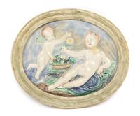 A Pair of Continental Ceramic Allegorical Plaques Width of larger 23 5/8 inches. — 19TH/20TH CENTURY