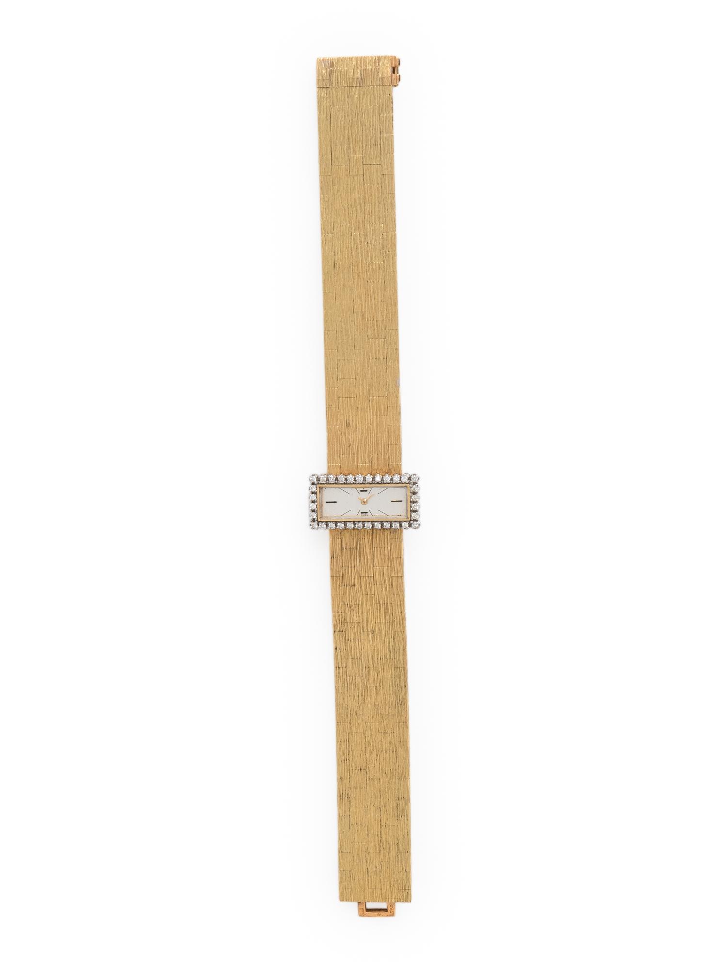 VACHERON & CONSTANTIN, 18K YELLOW GOLD BACKWIND WATCH WITH DIAMOND BEZEL