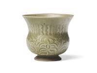 A Chinese Yaozhou Style Carved Celadon Leys Jar, Zhadou