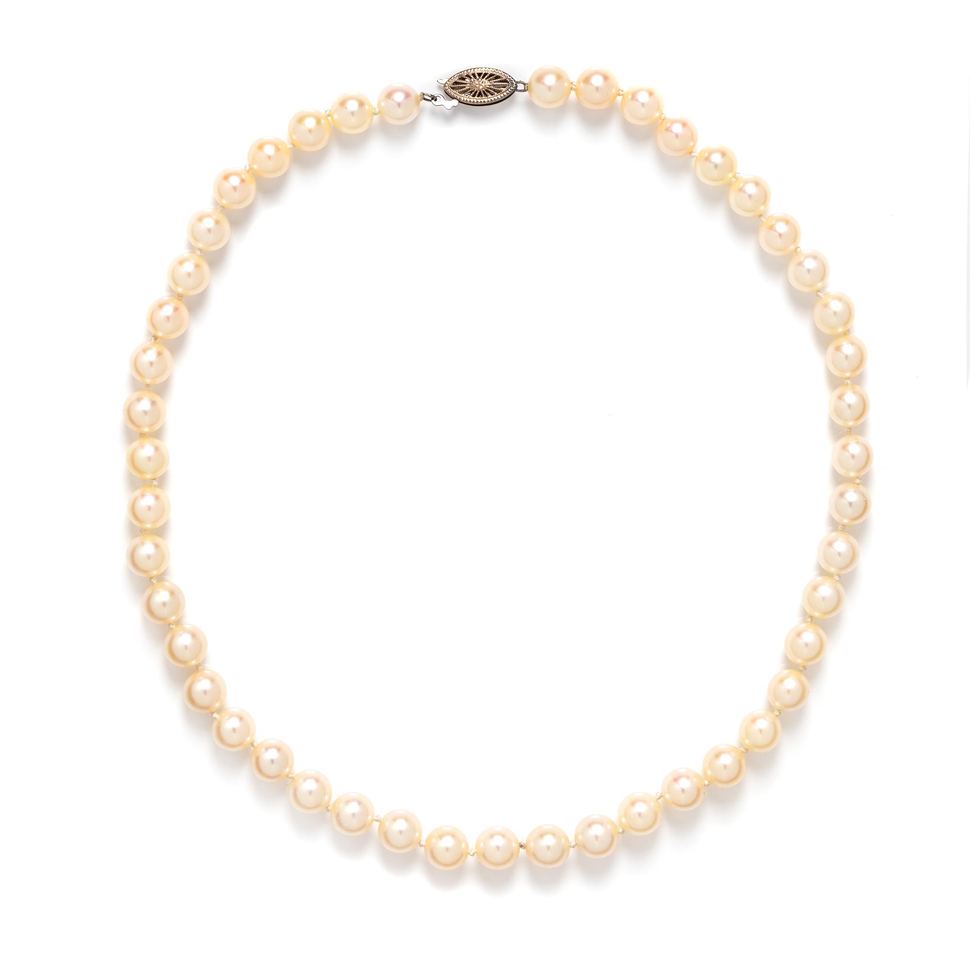 A 14 Karat White Gold and Cultured Pearl Strand Necklace,