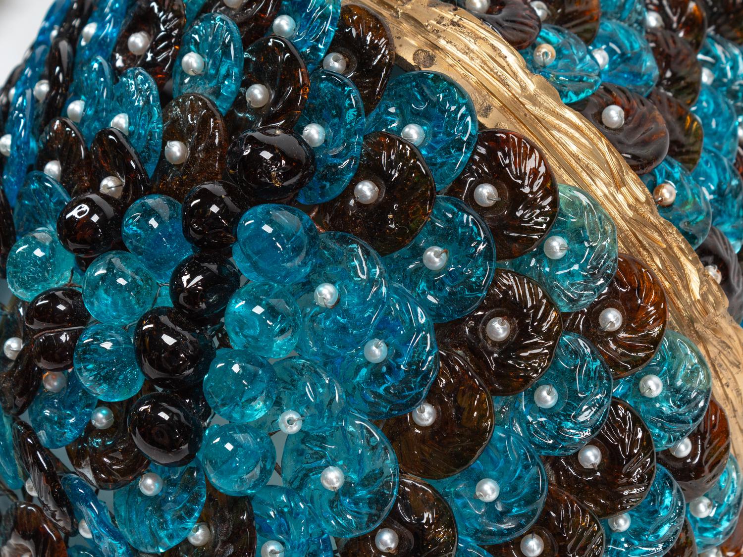 A Set of Four Gilt Metal and Colored Glass Wall Ornaments