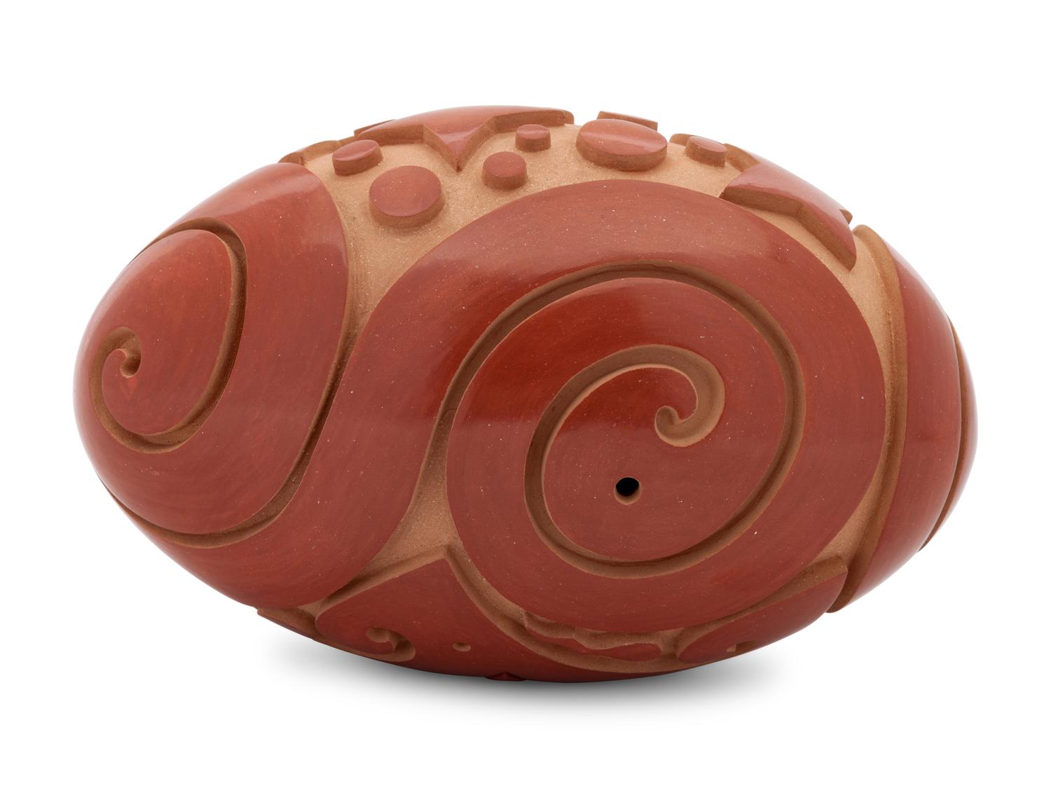 Polished and Carved Redware Pottery Vessel, with stars and swirls