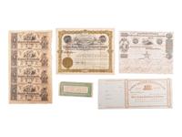 [STOCKS & BONDS] Lot of 33 both used and unused stocks, checks, and bonds as well as store certificates.