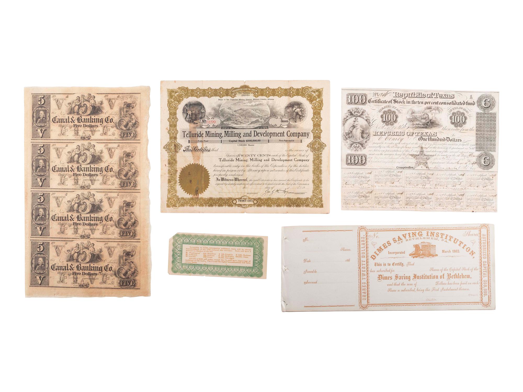 [STOCKS & BONDS] Lot of 33 both used and unused stocks, checks, and bonds as well as store certificates.